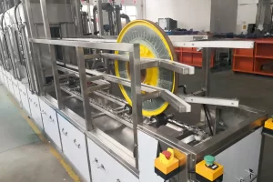 Elevator traction sheave cleaning and loading